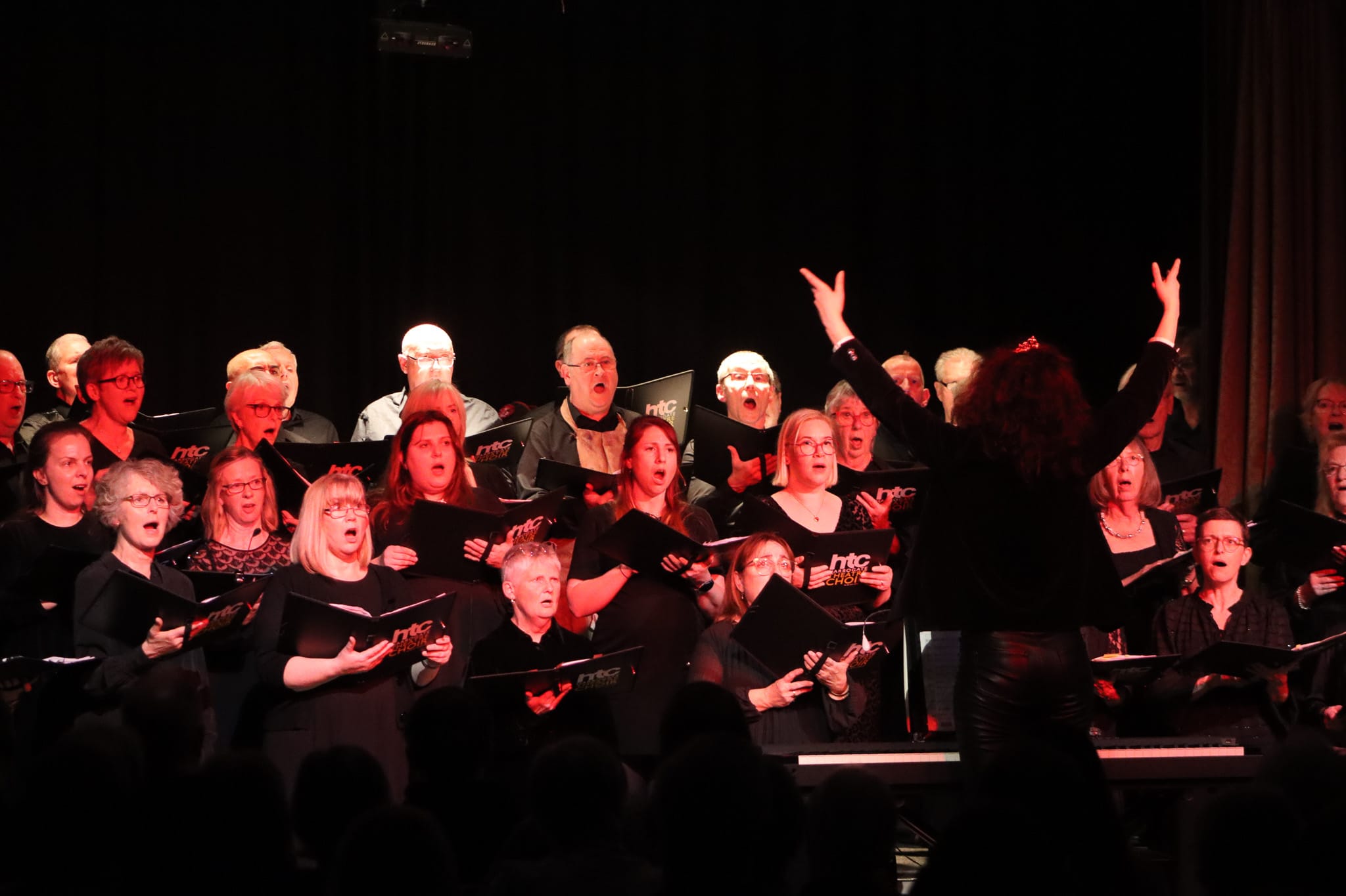 Harrogate Theatre Choir performing in concert, near Masham